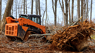 Land clearing and brush removal with heavy equipment in Atlanta, GA